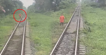เด็กน้อยแกล้งยืนขวางรถไฟ
