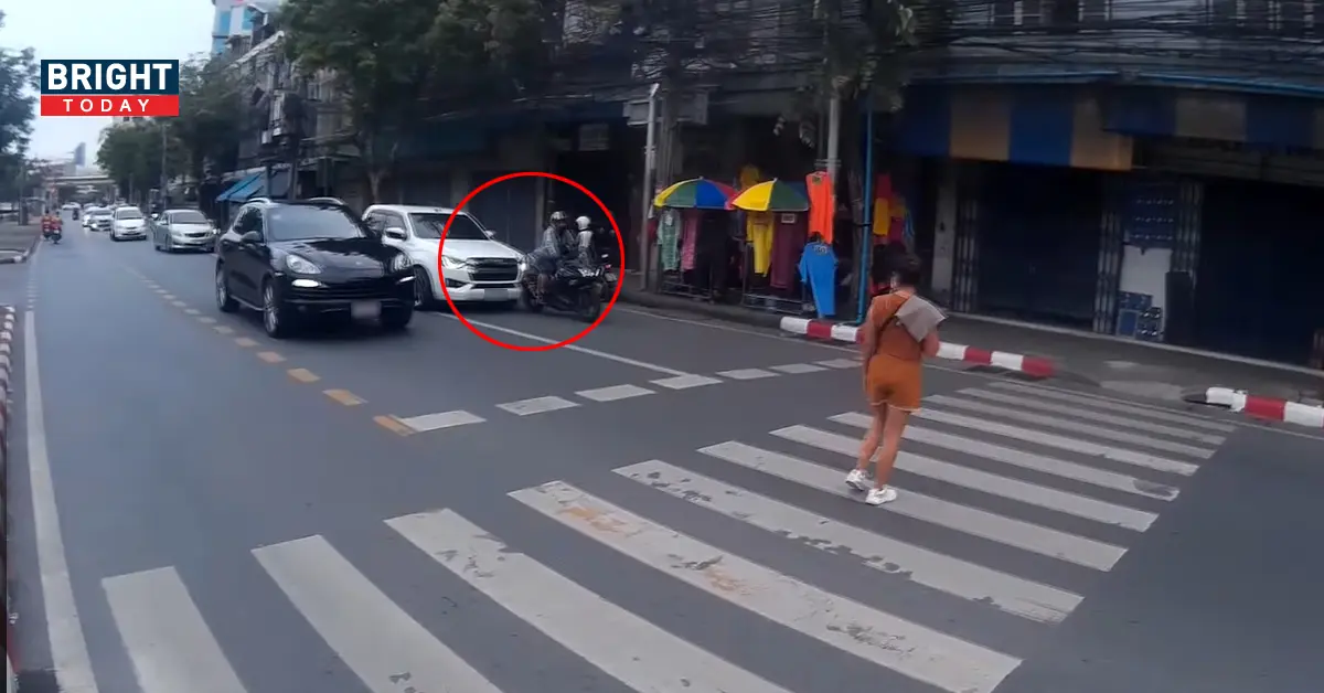 สาวข้ามถนนทางม้าลาย