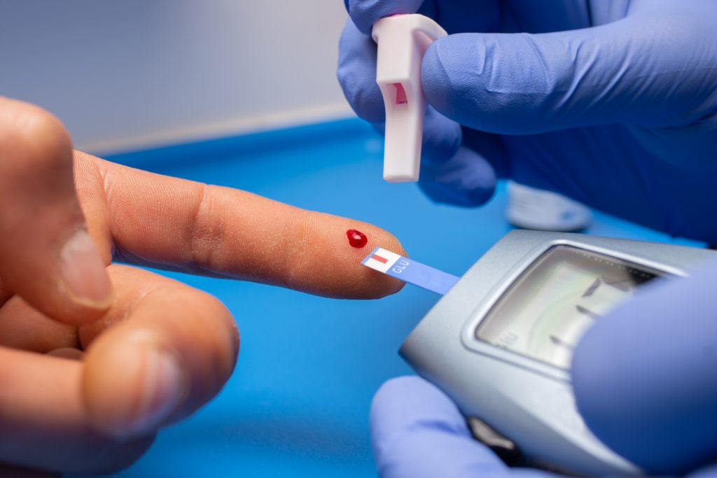 closeup-shot-doctor-with-rubber-gloves-taking-blood-test-from-patient