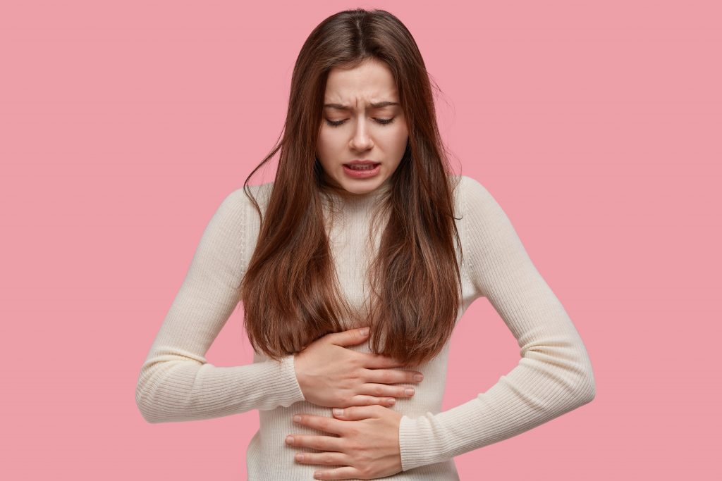image-unhappy-woman-suffers-from-stomachache-after-eating-spoiled-food-feels-discomfort-belly-has-disorder-1