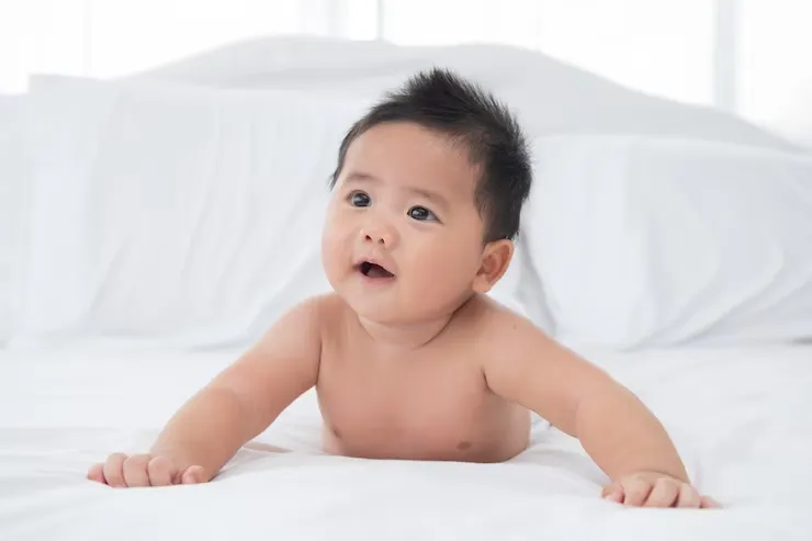 baby-boy-wearing-diaper-white-su