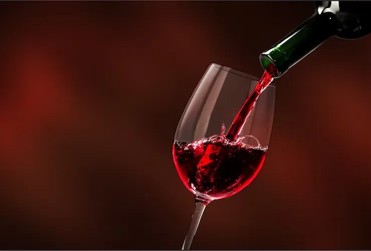 red-wine-being-poured-wineglass