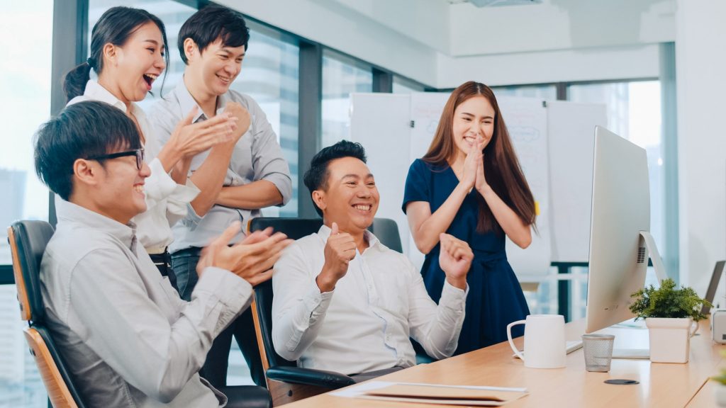 millennial-group-young-businesspeople-asia-businessman-businesswoman-celebrate-giving-five-after-dealing-feeling-happy-signing-contract-agreement-meeting-room-small-modern-office-min